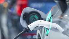 Electric car charging (close-up with graphics)