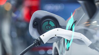 Electric car charging (close-up with graphics)