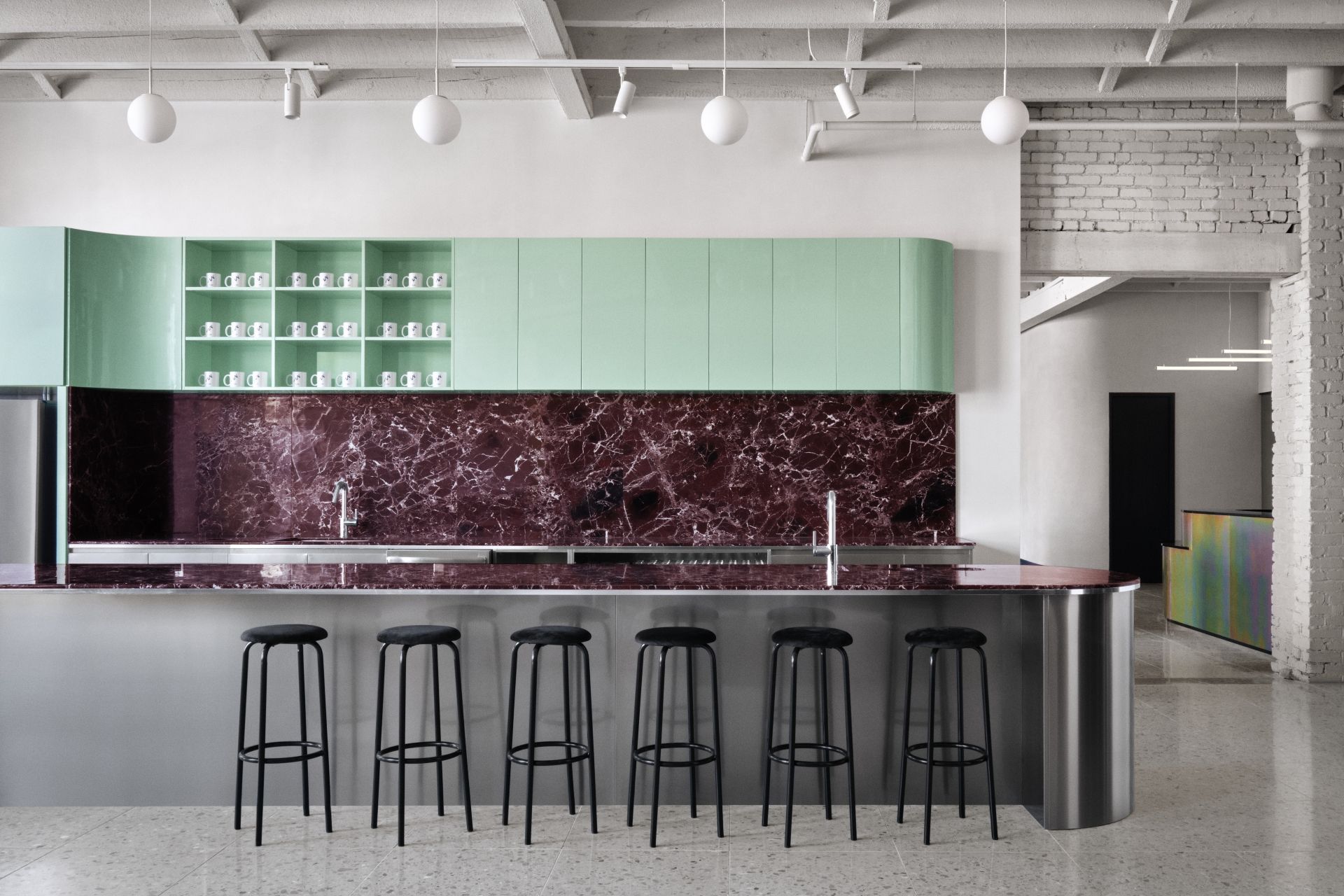 Spacial co-working space's bar area designed by Ivy Studio Inc in Montreal, Canada