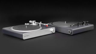 PR image of Victrola Hi-Res Carbon turntable showing both silver and black color options