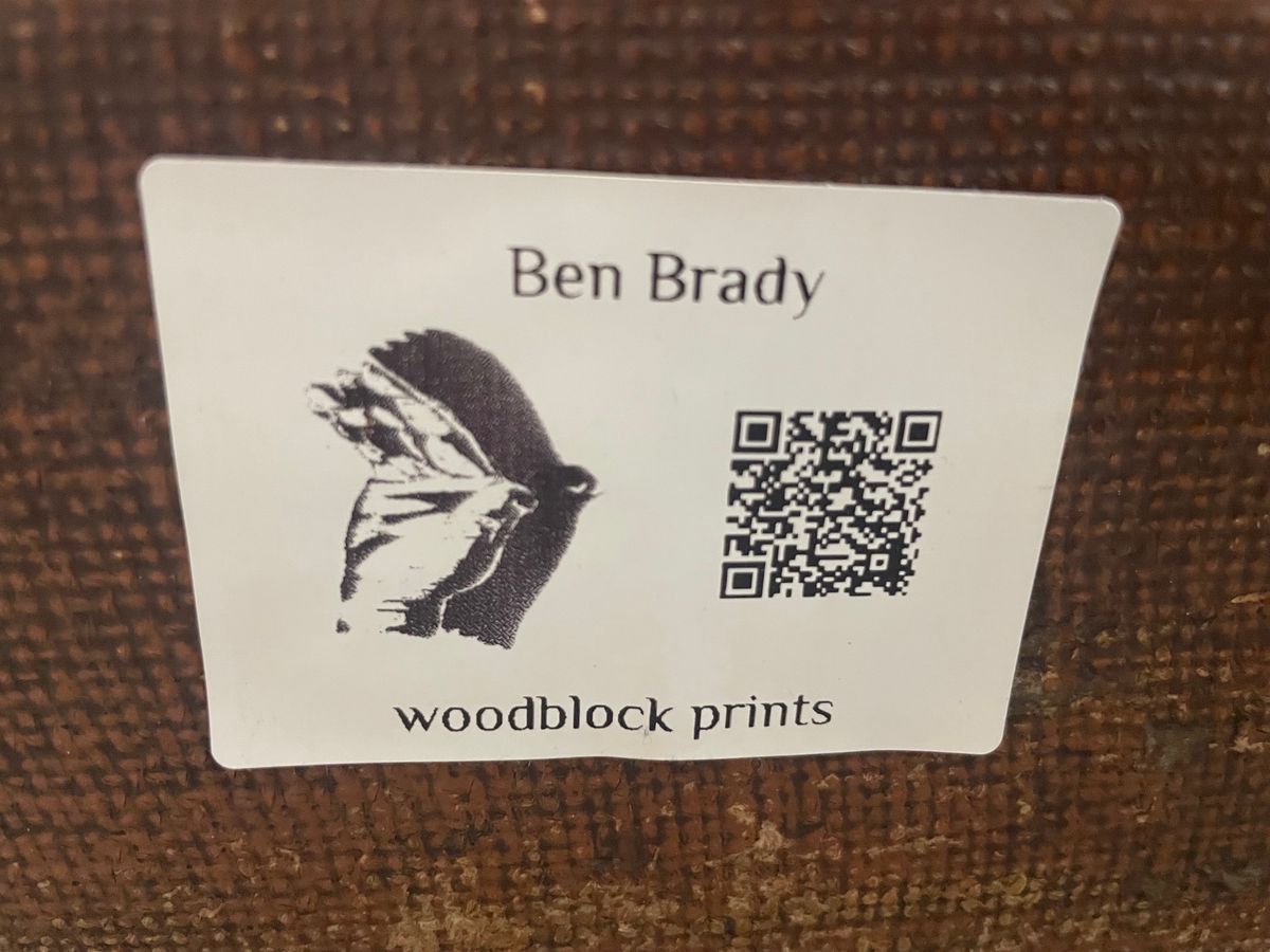 Label saying Ben Brady woodblock prints with QR code and logo