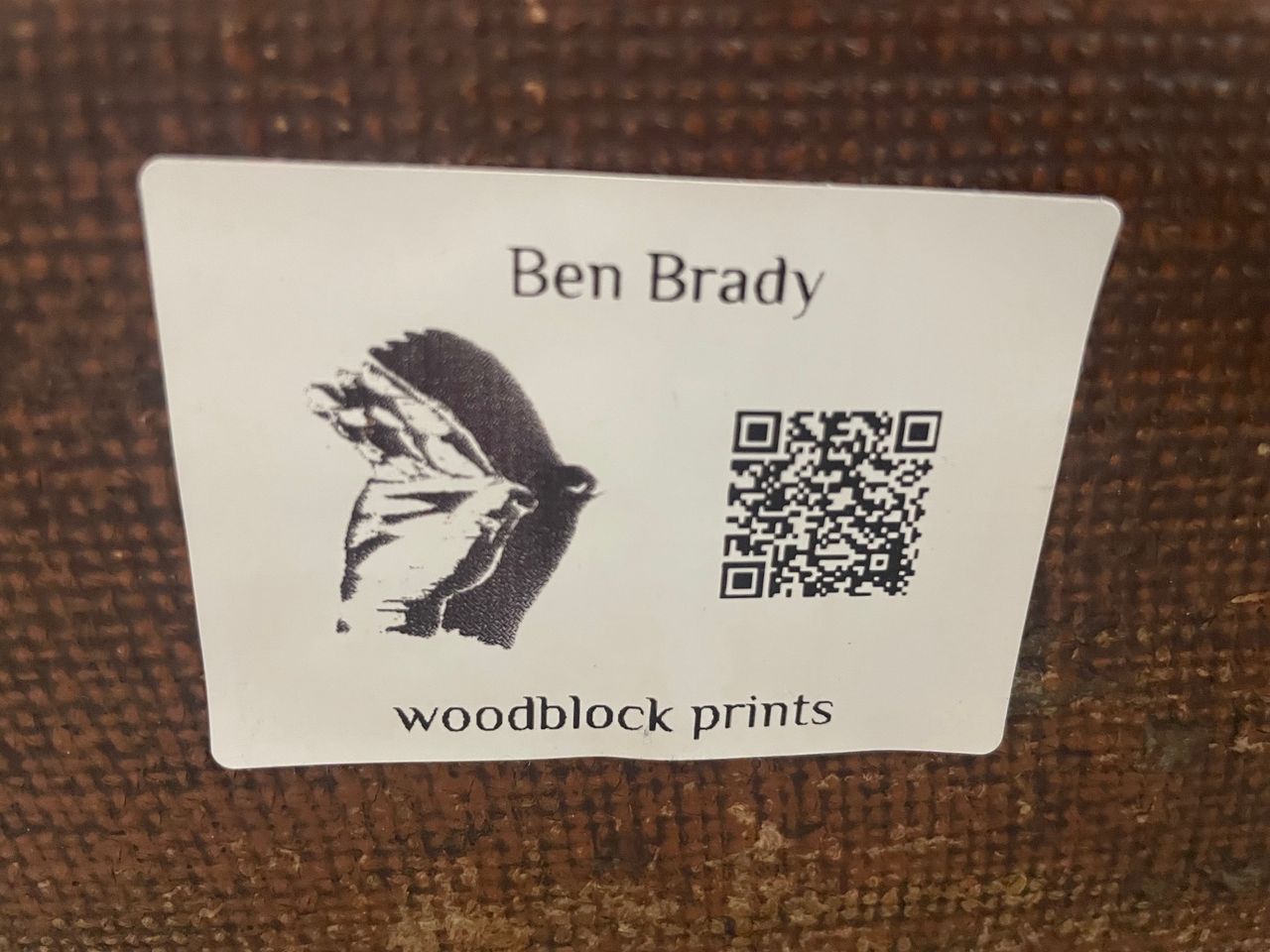 Label saying Ben Brady woodblock prints with QR code and logo