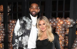 Khloé Kardashian, Tristan Thompson pose for a photo as Remy Martin celebrates Tristan Thompson's Birthday at Beauty & Essex on March 10, 2018 in Los Angeles, California