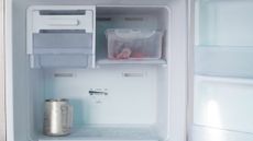 Empty freezer compartment after following steps for how to defrost a freezer