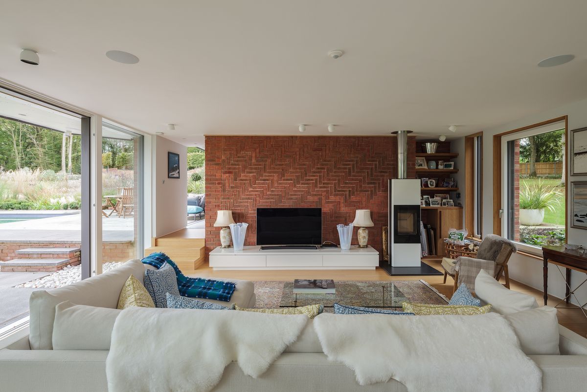 brick wall in modern living room with stove