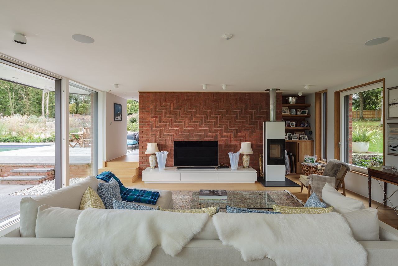 brick wall in modern living room with stove