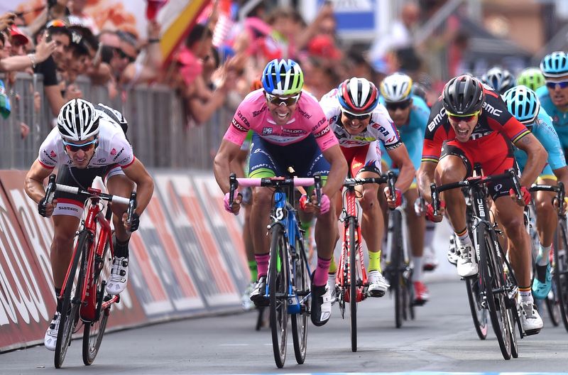 Fabio Felline and Philippe Gilbert sprint either side of stage winner Michael Matthews
