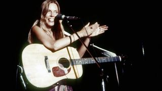 Joni Mitchell plays the Community Center in Berkley, CA. 1974. She is playing a Martin dreadnought