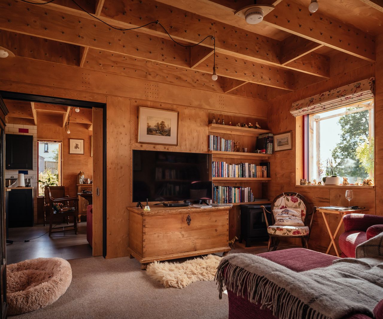Living room in a flat-pack timber home built sustainably from modular panels