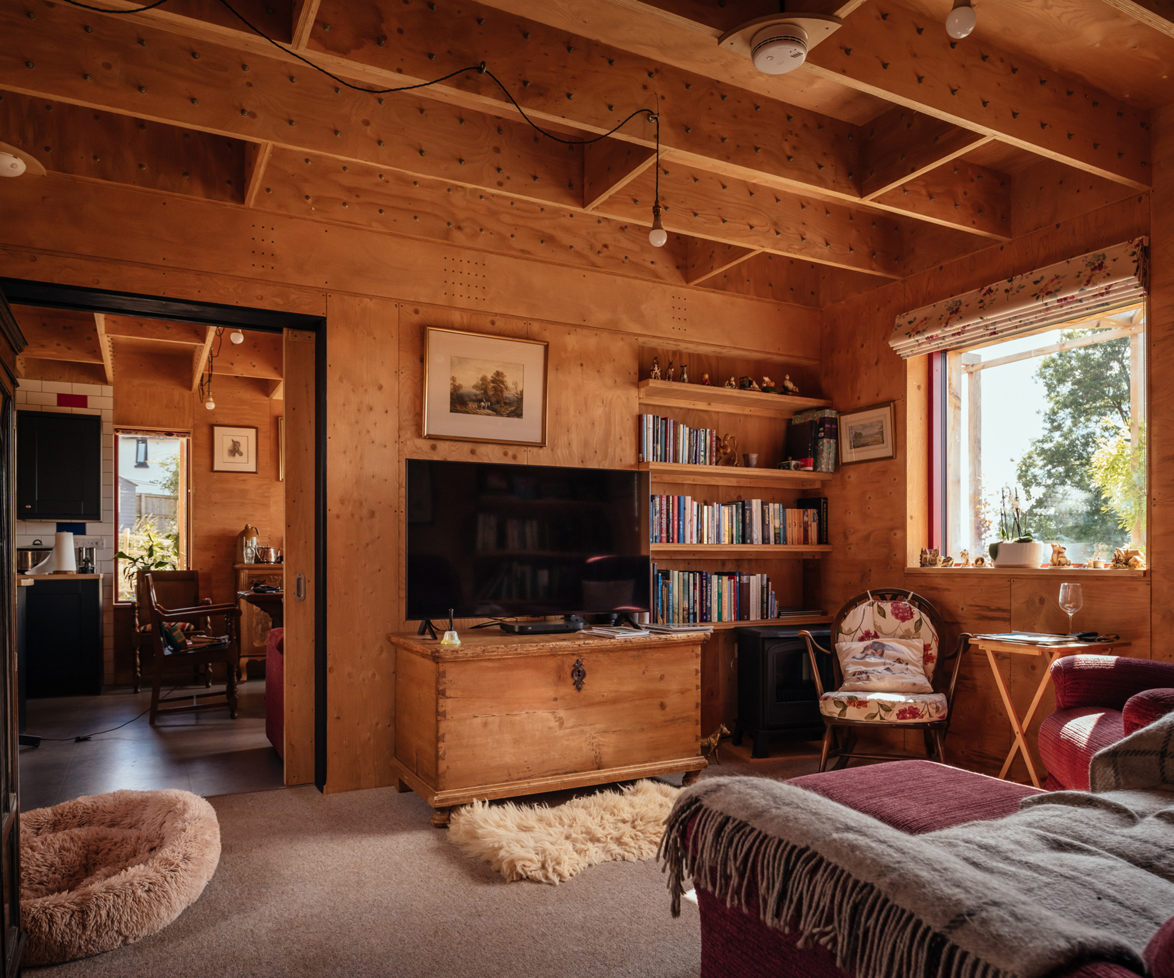 Living room in a flat-pack timber home built sustainably from modular panels