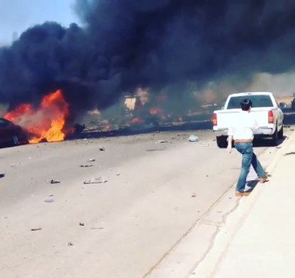 Dramatic video shows moments after military jet crashes into California neighborhood
