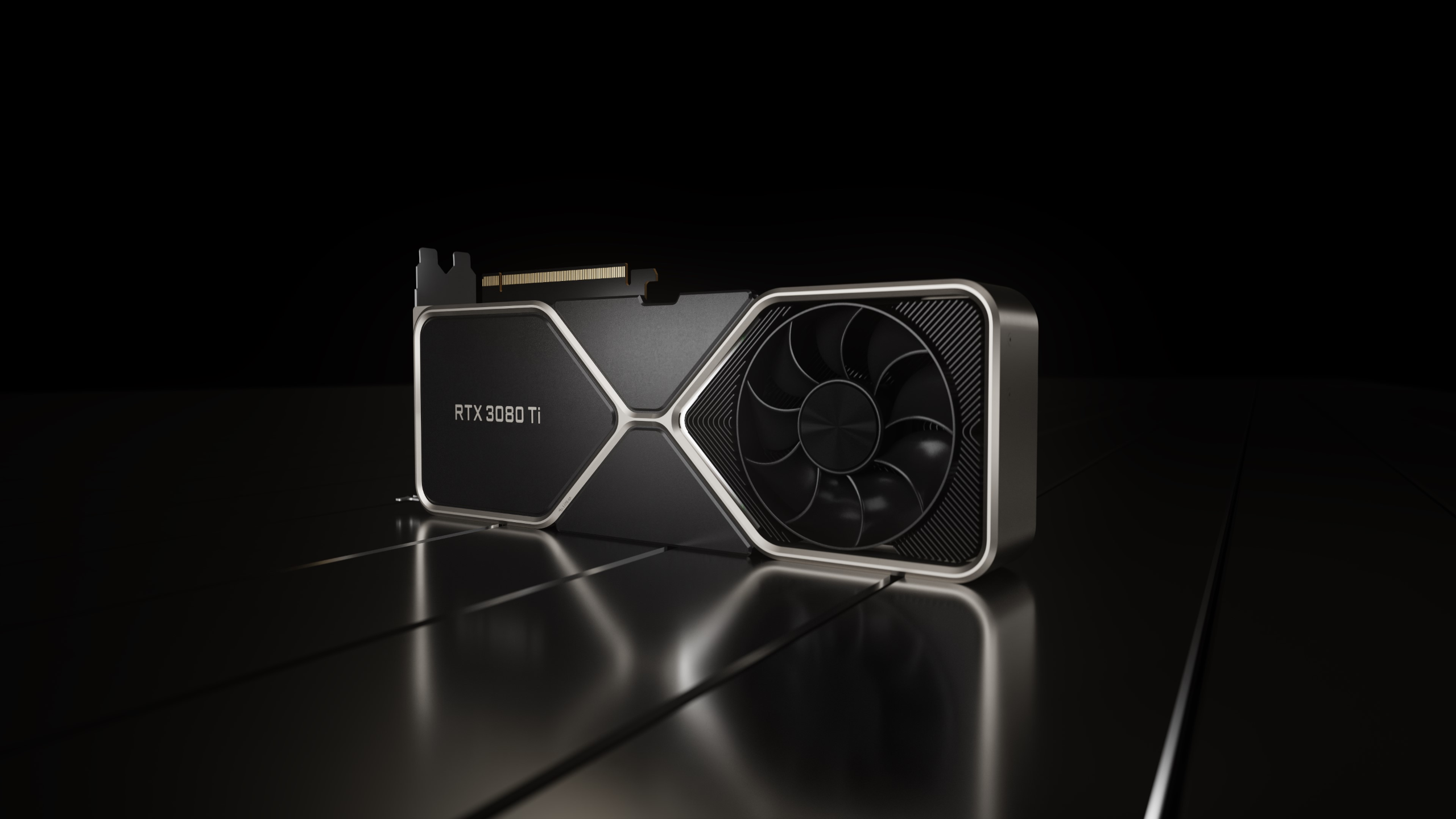 Nvidia GeForce RTX 3080 Ti Founders Edition graphics card on a reflective black surface