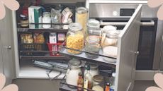  pull out kitchen draw with various dry ingredients and food products that could be housing common kitchen cupboard pests