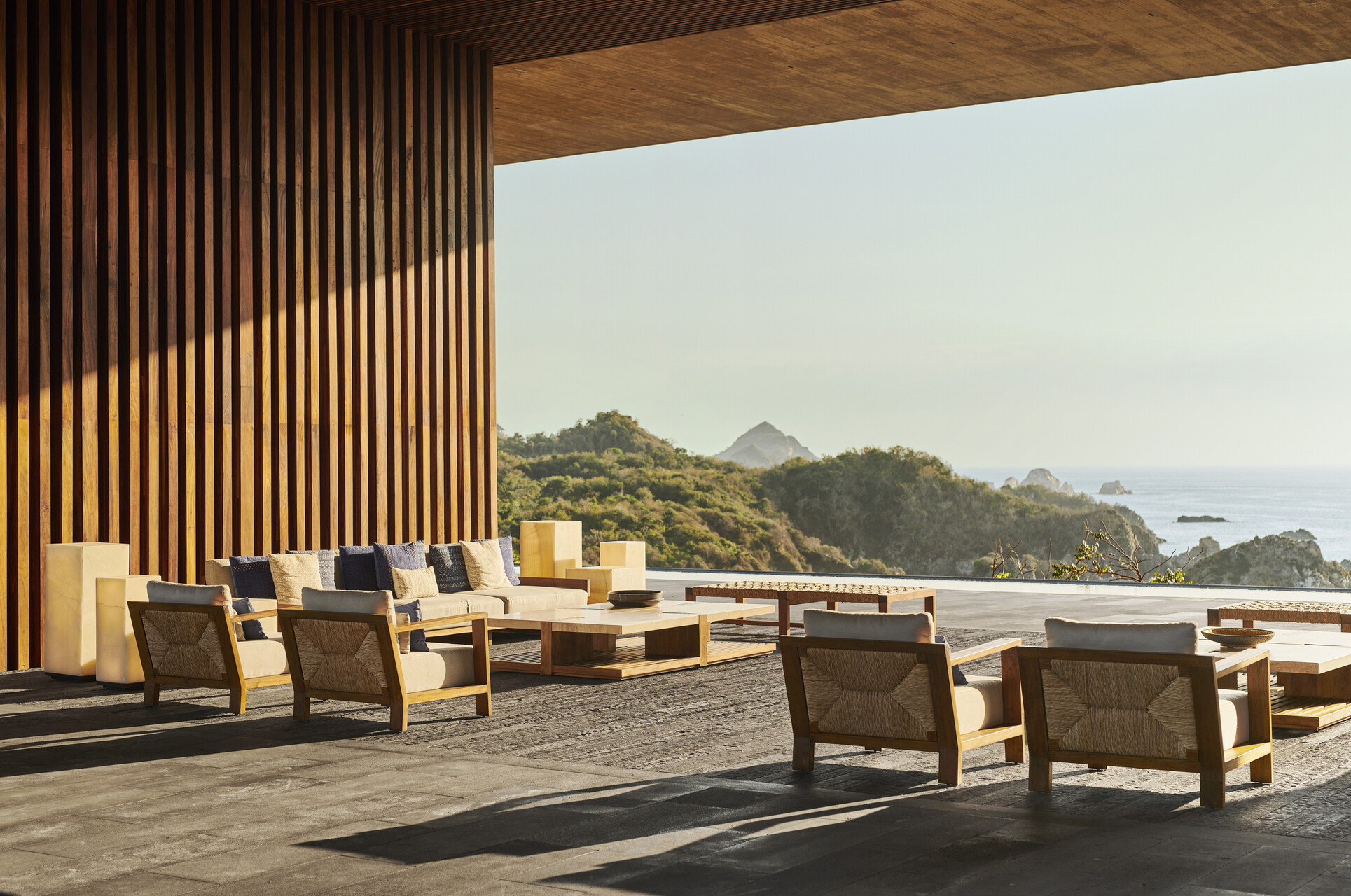 The greeting pavilion at the Four Seasons Tamarindo lit by golden hour