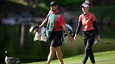Nelly Korda and caddie