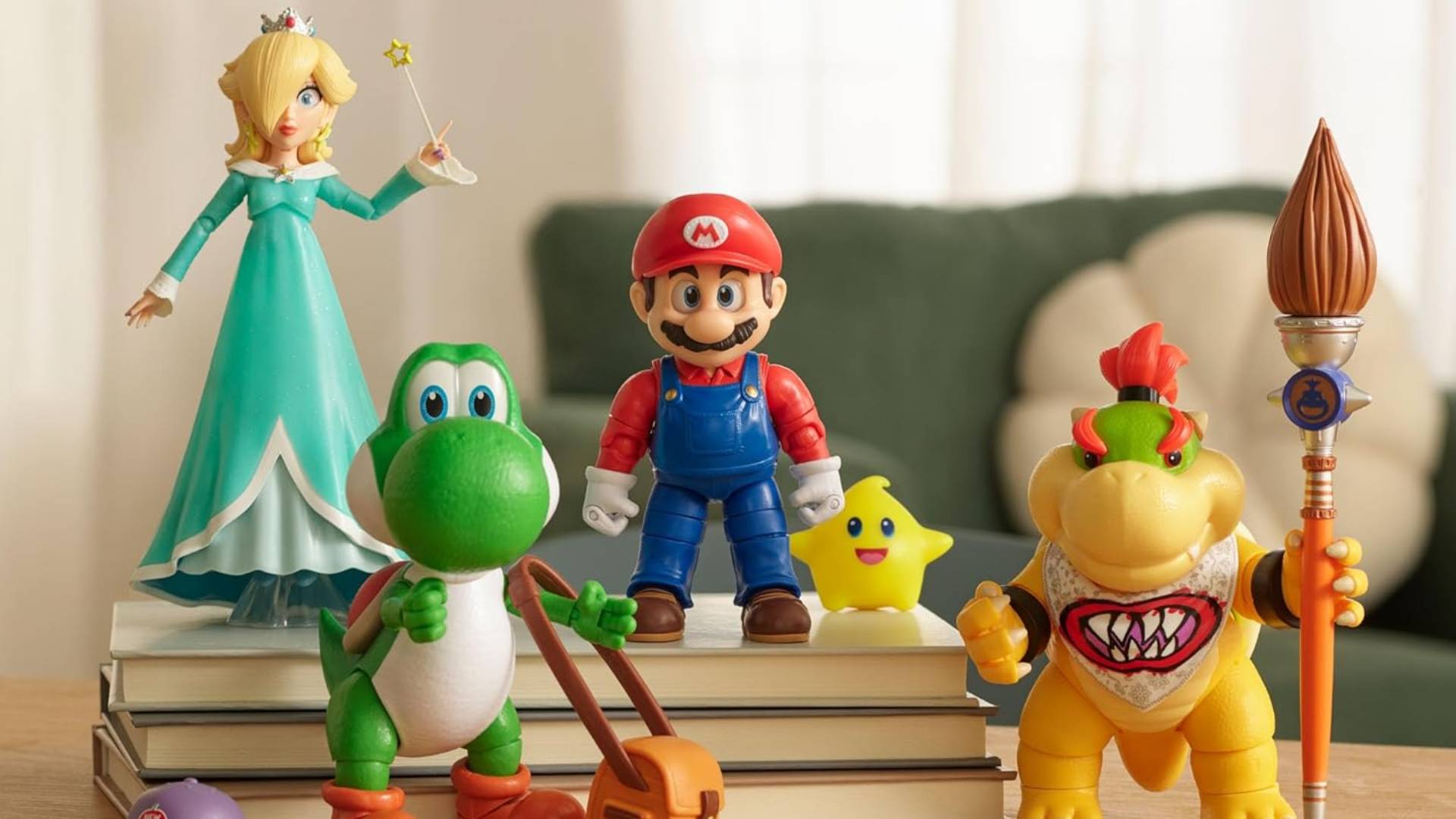 Image of the line of 5-inch Super Mario Galaxy Movie toys standing on a table.