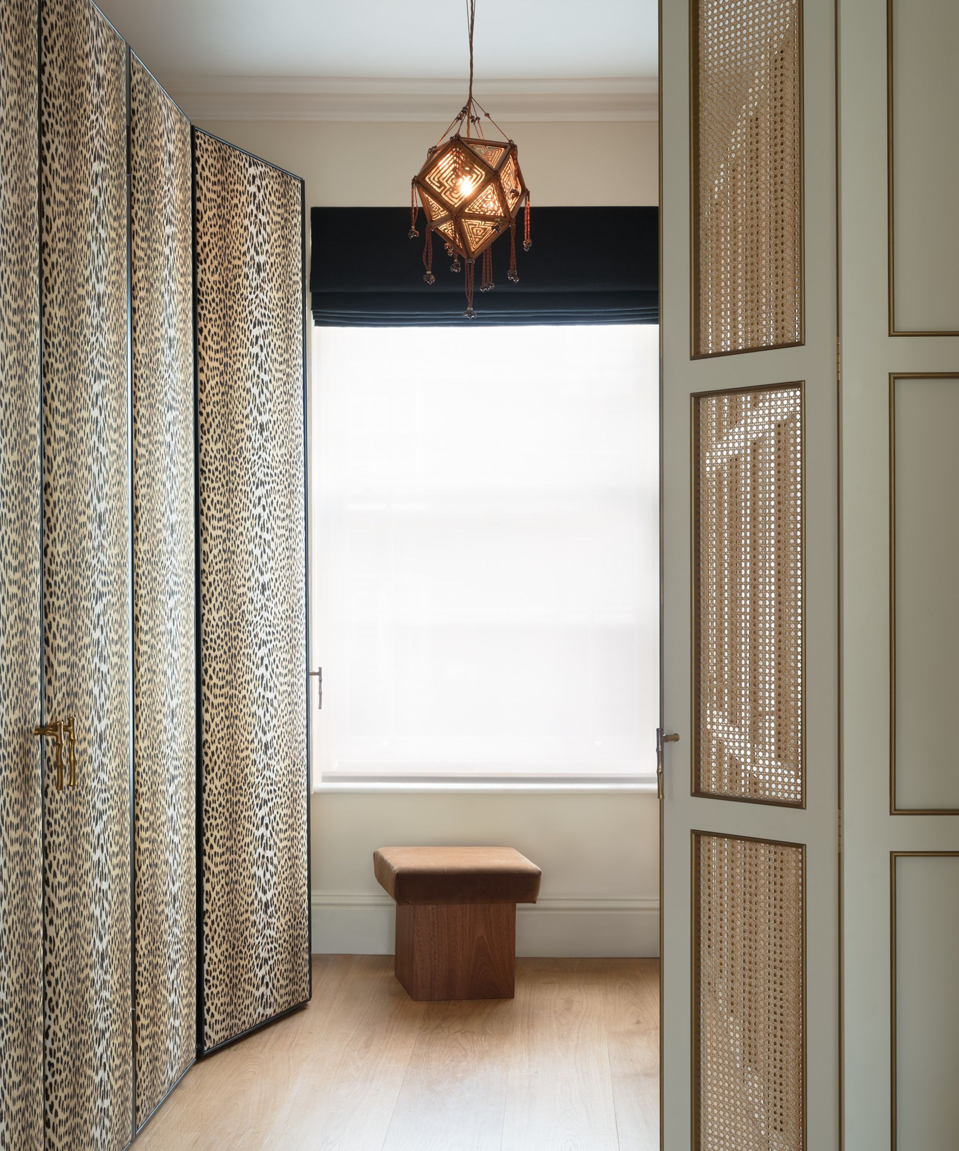 Dressing room with inbuilt walk in wardrobes designed by Fran Hickman