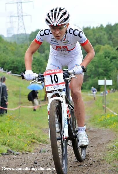 Maja Wloszczowska riding alone.