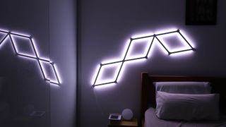 Nanoleaf Lines in solid white light attached to a wall