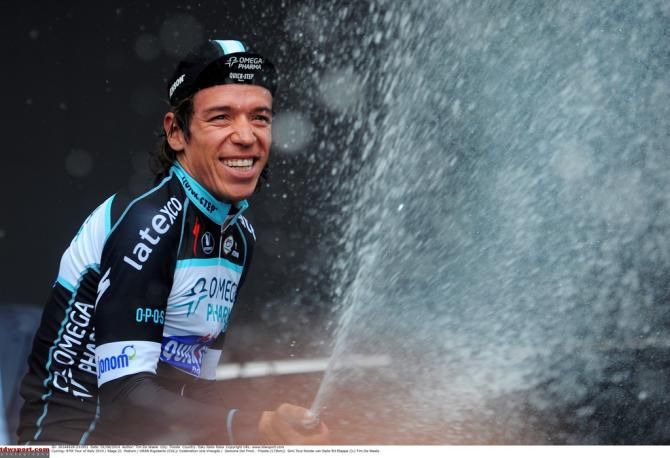 Rigoberto Uran (Omega Pharma-Quick Step) enjoys a spray of champagne