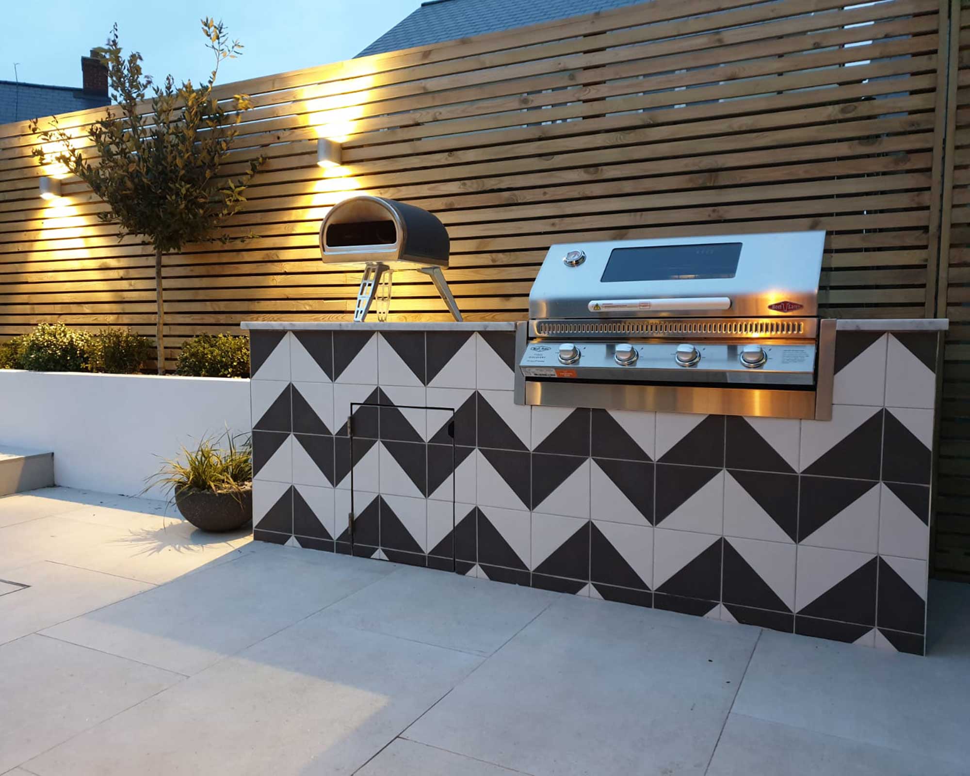 outdoor grill station with monochrome tiles