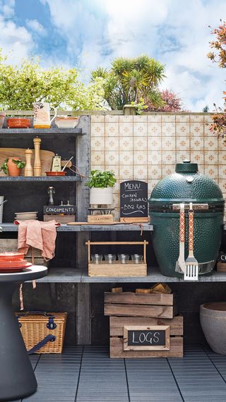 Outdoor kitchen area with barbecue and shelves