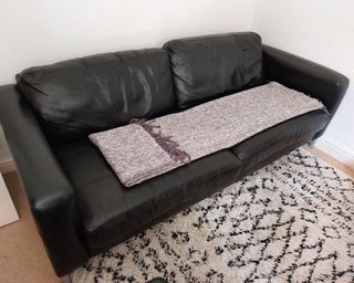blanket folded on sofa for tiktok hack
