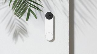 Nest Doorbell Battery in white mounted to concrete wall