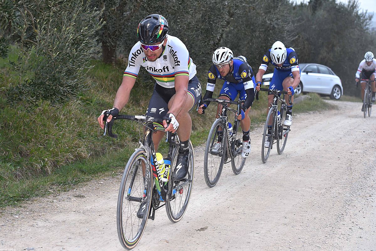 Zdenek Sybar and Gianluca Brambilla sit on Peter Sagan's wheel