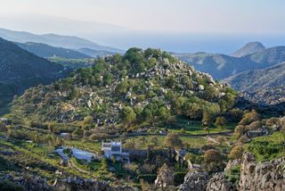 The island of Tinos with Xinara House in the foreground