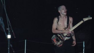 John Frusciante performing with Red Hot Chili Peppers in 1988