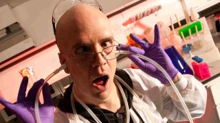 Devin Townsend posing for a photograph in 2012