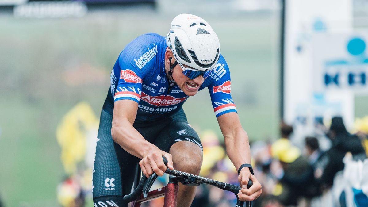 Mathieu van der Poel chasing Tadej Pogacar in the final kilometres of the 2023 Tour of Flanders