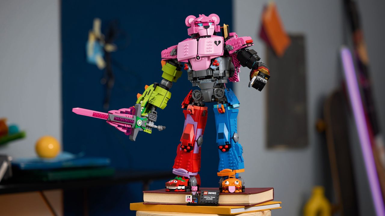 Lego Mecha Team Leader standing on a pile of books