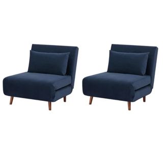 A set of two blue fold-out sleeper chairs. 