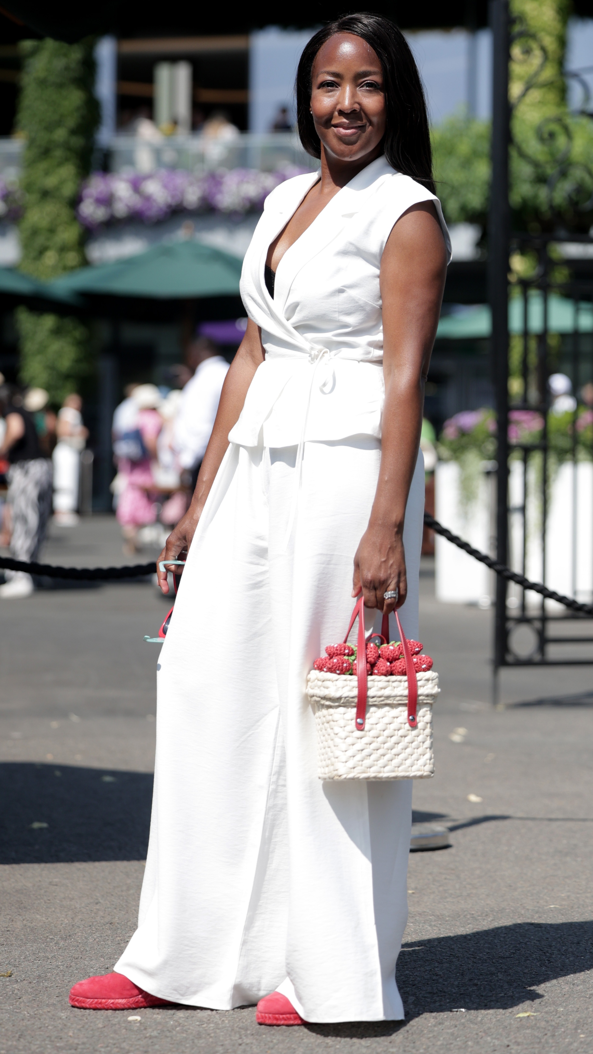 Angellica Bell arrives during day eleven of the 2026 Wimbledon Tennis Championships at All England Lawn Tennis and Croquet Club on July 09, 2026