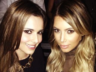 Cheryl Cole cosies up to Kim Kardashian during Kanye West's LA gig