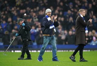 Dele Alli is presented at Goodison Park