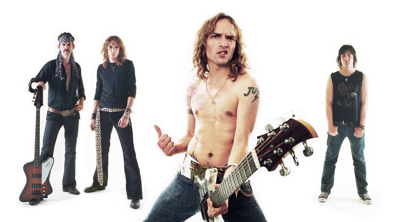 The Darkness in 2003, studio portrait