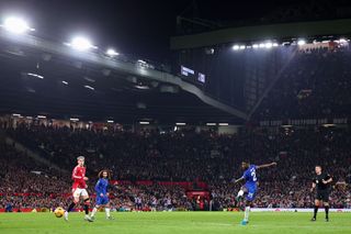 Moises Caicedo of Chelsea scores a goal to make it 1-1 during the Premier League match between Manchester United FC and Chelsea FC at Old Trafford on November 3, 2024 in Manchester, England.