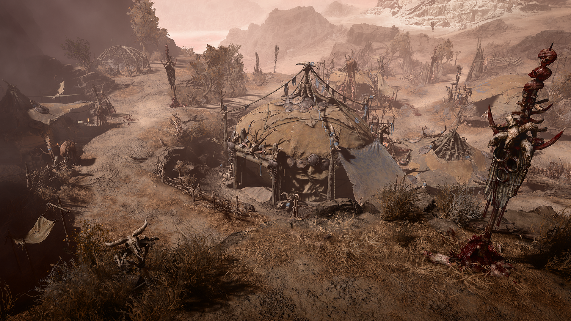 Diablo 4'te tozlu bir çorak arazide bir kamp yeri.