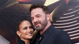 Jennifer Lopez smiling at Ben Affleck at the premiere of The Flash 