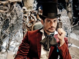 David Gandy sits at a feasting table in the M&S Christmas advert