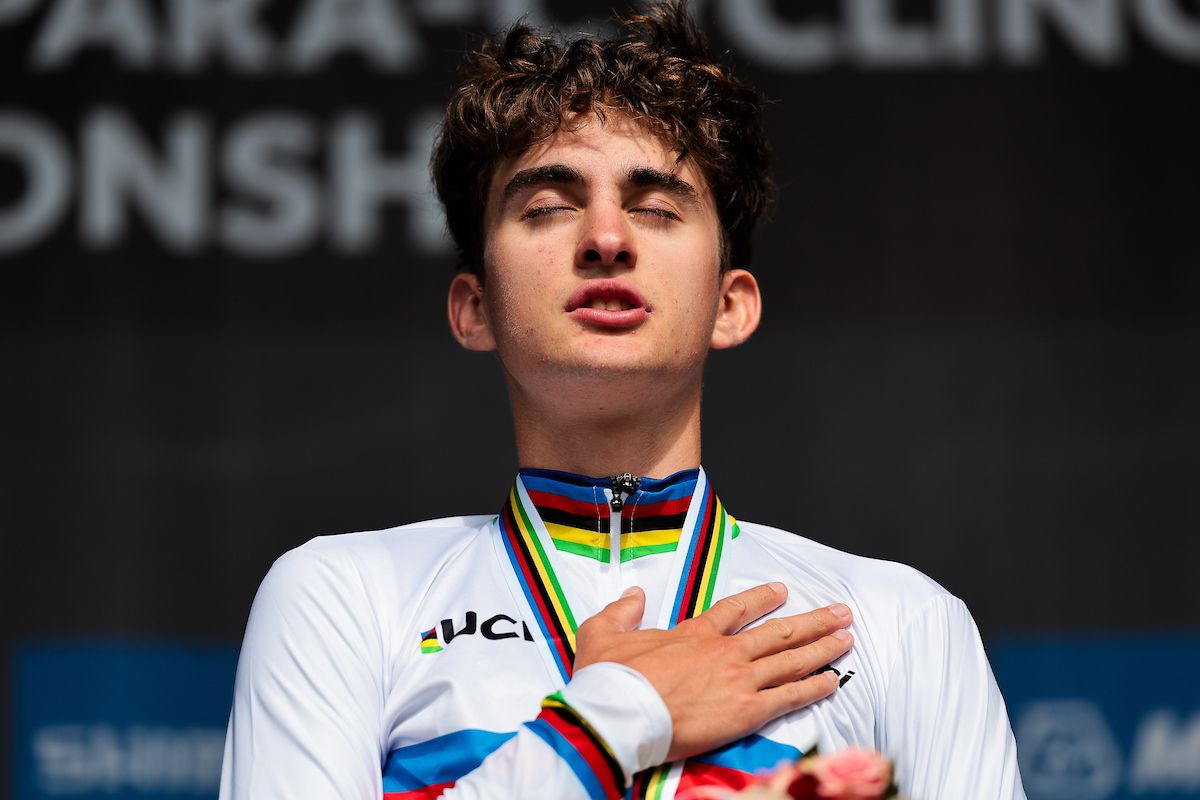 Picture by Alex Whitehead/SWpix.com - 23/09/2024 - 2024 UCI Road and Para-cycling Road World Championships, Zurich, Switzerland - Menâ€™s Junior Individual Time Trial (ITT) Podium - Paul Seixas (France) on the podium receiving the Gold Medal to become World Champion