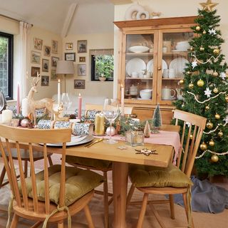 dining room with wooden table and chairs for Christmas