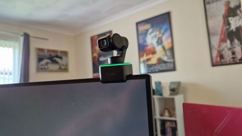 Insta360 Link webcam sat atop a monitor