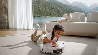 Dreame L40 Ultra robot vacuum cleaning in a family home