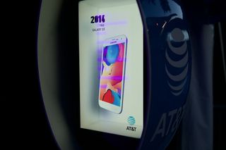AT&T's activation debuting the Proto M hologram device in Dallas to sunning spinning holograms about the history of the mobile phone.