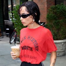 Zoe Kravitz wore track shorts with peep-toe heels in New York City