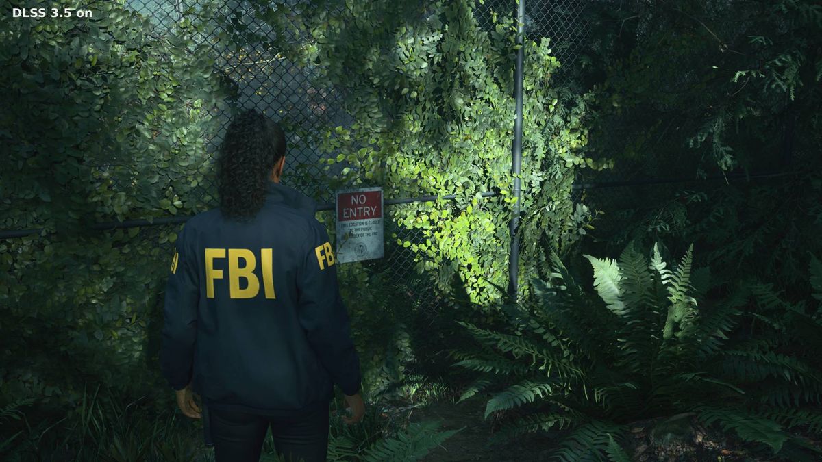 Alan Wake 2 screenshot with Ray Reconstruction on next to car